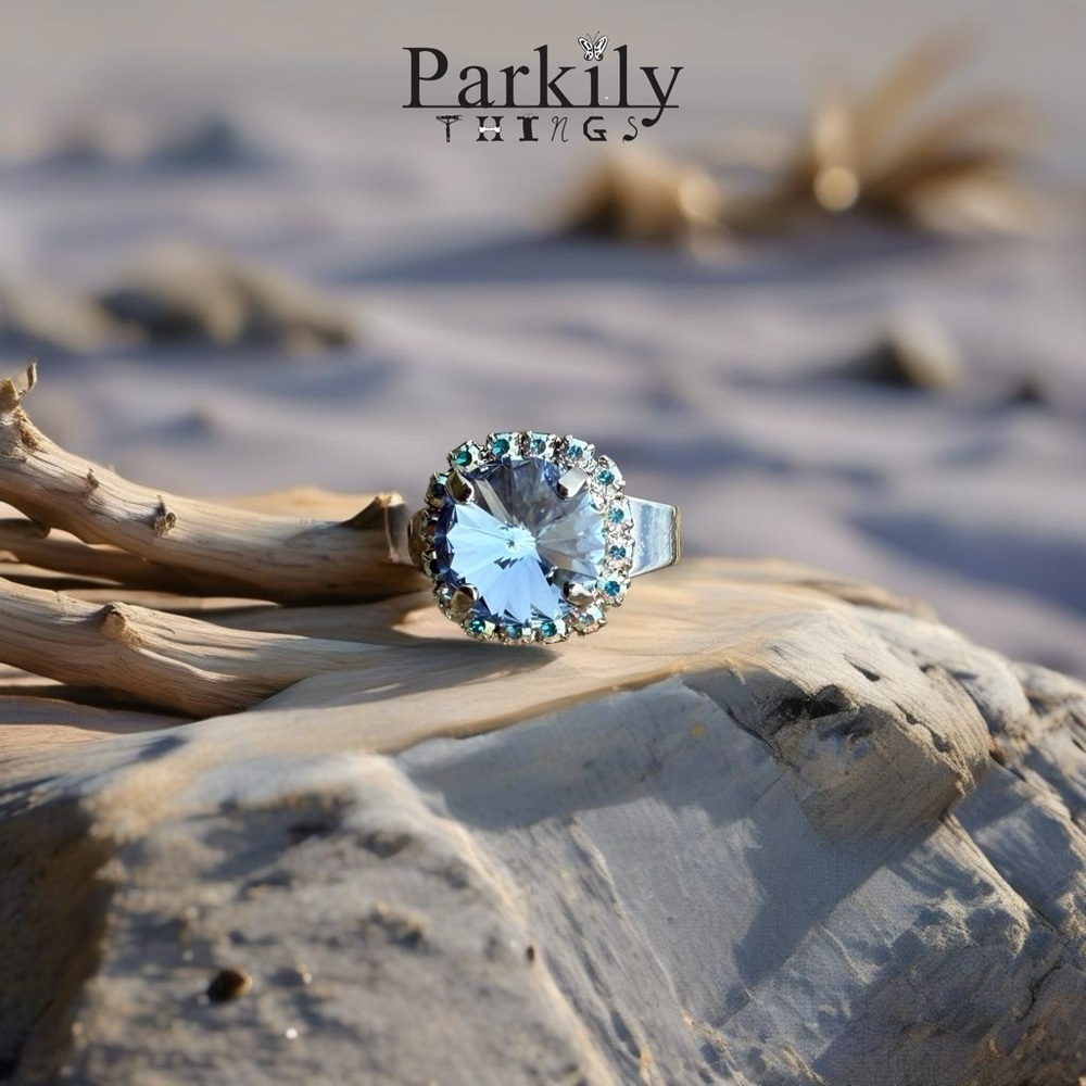 Handcrafted ring made with light sapphire Swarovski crystal size adjustable